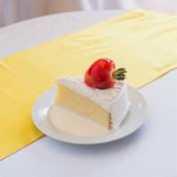 Tres Leches Cake Slice · A popular Latin American cake made of vanilla cake, dipped in 3 types of sweet milk.