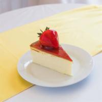 Cheesecake Slice · New York style topped with a freshly glazed strawberry.