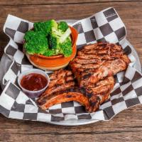 BBQ Pork Chops · Two grilled pork chops with your choice of one side.