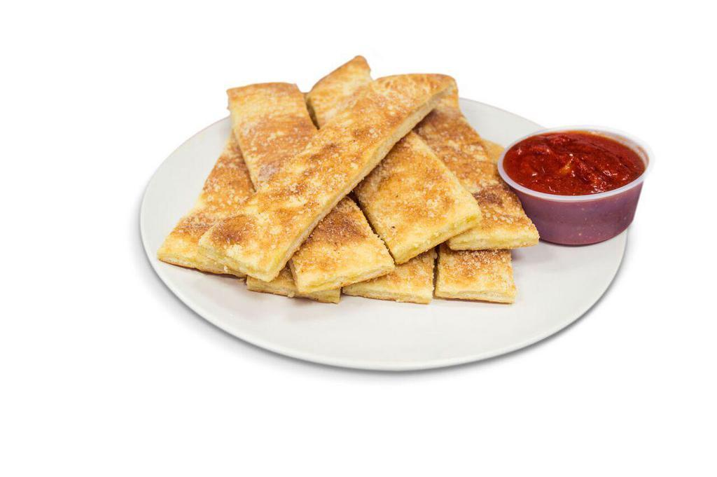 Garlic Parmesan Breadsticks · Brushed with butter and garlic, topped with Parmesan cheese. Served with pizza sauce.