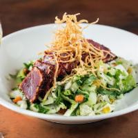 Ahi Tuna Chopped Salad · Rare togarashi spiced seared tuna, napa cabbage, romaine, bok choy, bell peppers, black sesa...