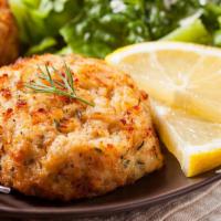 The Fish Burger · Fish of the day and chef pairing, grilled onions, lettuce, and tomato.