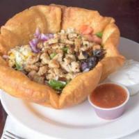 Chicken Taco Salad · Grilled chicken with shredded cheddar and mozzarella blend, black olives, diced tomato, red ...
