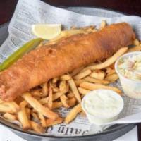 Fish and Chips · Beer battered and fried golden brown. Served with tartar sauce, coleslaw, a lemon wedge and ...
