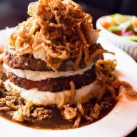 Meatloaf Stacker · Better than your Mama’s' Made from scratch meatloaf stacked between garlic mashed potatoes i...
