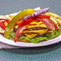 8.cheeseburger and Fries · Quarter lb. black Angus burger well seasoned and grilled, topped with melted cheese and serv...