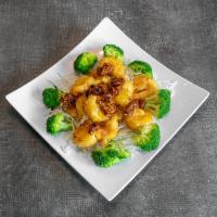 CS10. Honey Walnut Shrimp · Lightly battered fried prawns in a honey glaze, gamished with broccoli and topped with walnu...