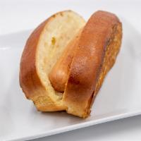 Hot Dog · 100% all-beef hot dog, brioche bun, your choice of condiments on the side.