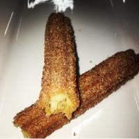 Churros · Churros filled with strawberry, vanilla, chocolate, wrapped in sugar with cinnamon