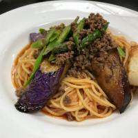 Eggplant and Spicy Ground Beef · Eggplant & spicy ground beef with asparagus in a tomato garlic oil sauce with spaghetti past...