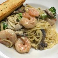 Shrimp and Shiitake Mushroom · Shrimp, shiitake, enoki, button mushrooms, onions and broccoli in our carbonara sauce with s...