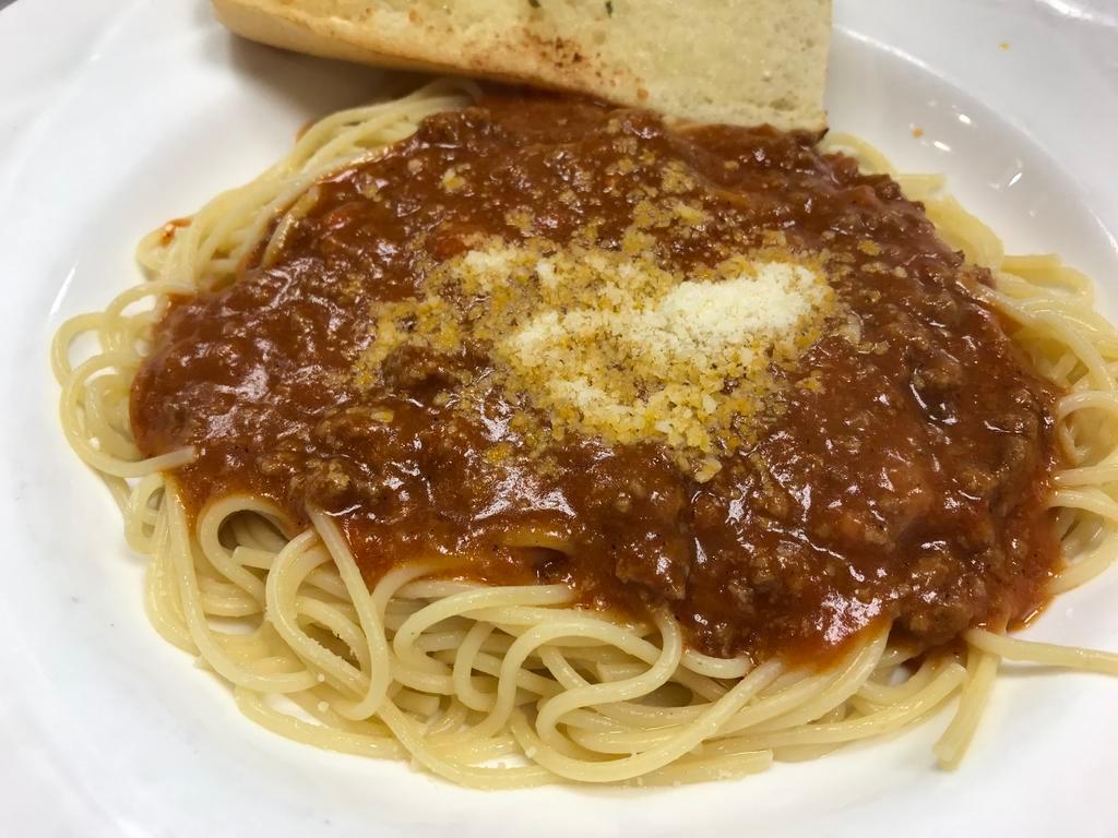 Bolognese · Original meat and tomato sauce with spaghetti pasta. Served with garlic bread.
