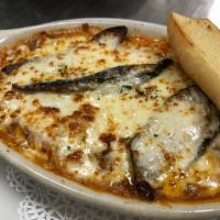 Meat Sauce and Eggplant Gratin · Bolognese sauce & eggplant over spaghetti pasta topped with mozzarella cheese then baked. Se...