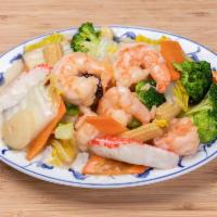 A16. Seafood Combo · A delightful blend of jumbo shrimp, scallops and crab meat sauteed with mixed vegetables.
