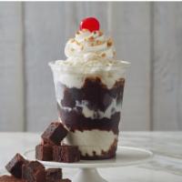 Fudge Brownie Delight · Warm up with 2 hot fudge brownies topped with your choice of ice cream, a mix-in, hot fudge ...