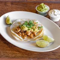 Super Taco · Meat (chicken or pork or fish), onion, cilantro and green salsa, cheese, guacamole and sour ...