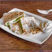 Cheese Quesadilla · Cooked tortilla that is filled with cheese and folded in 1/2. 