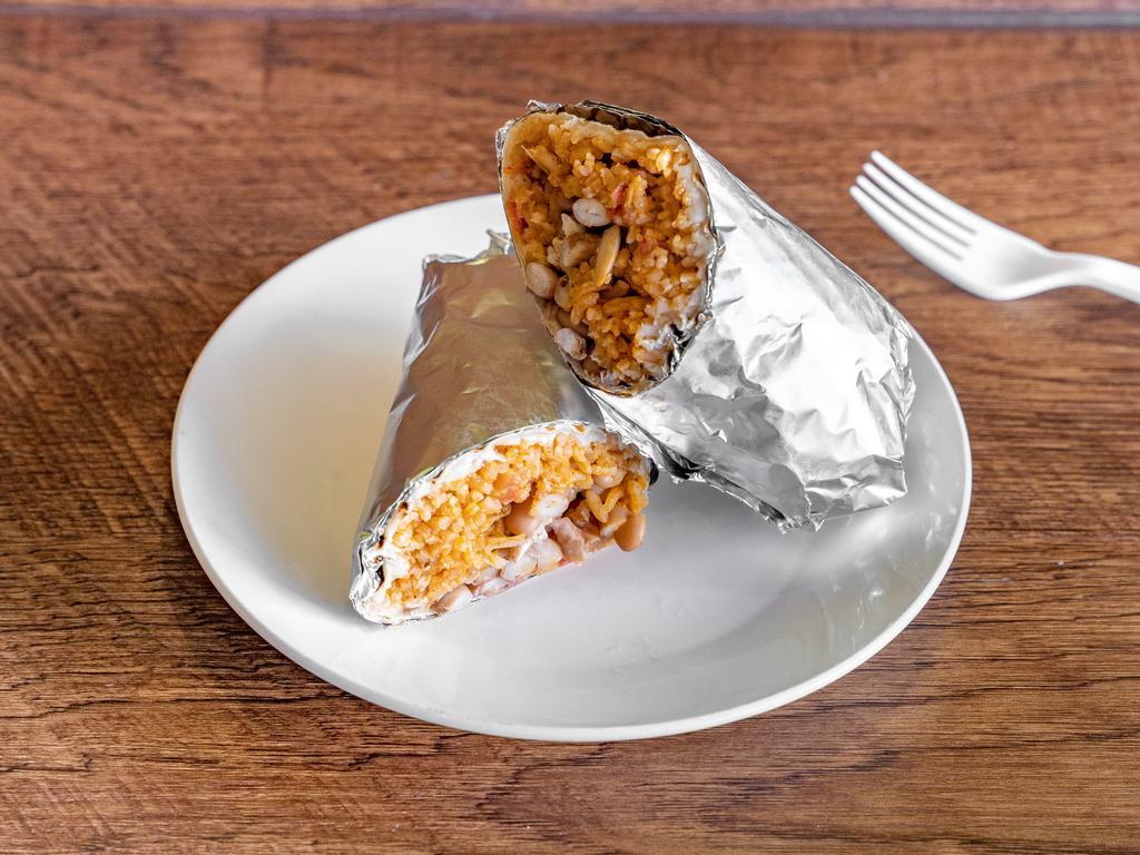 Kids Burrito · Grilled chicken, rice, beans and cheese.