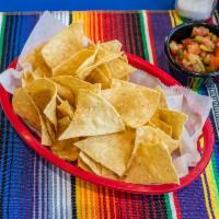 Chips and Salsa · Homemade tortilla chips and pico de  gallo.