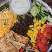 Southwestern Chicken Salad · Mixed greens, tomatoes, cucumbers, cheddar cheese, black beans, corn and crispy tortilla str...