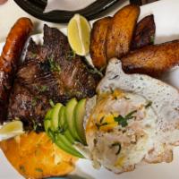 Bandeja Tipica Colombiana · Grilled steak, chorizo, crispy pork belly, avocado, fried egg and sweet plantins.