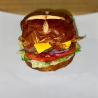 Bacon Cheese Burger · Angus beef patty, bacon slices with chopped lettuce, a slices of tomato, red onion, and mayo...