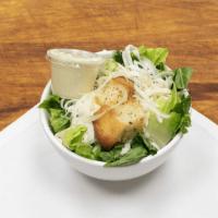 Caesar Salad · Romaine lettuce with croutons and shaved Parmesan and served with Caesar dressing.