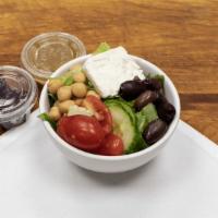 Greek Salad · Romaine lettuce, Kalamata olives, feta cheese, beets, tomato, chickpeas, cucumbers and serve...