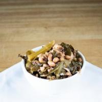 Collard Greens · Braised greens with black eyed peas and smoked meats. A meal in a side!

