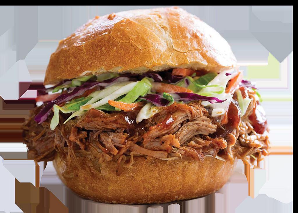 Pulled Pork Sandwich Combo · Savory pulled pork on a Kaiser roll with fresh shredded cabbage and carrots drizzled with BBQ and our House 
