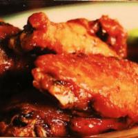 Chicken Wings · 6 wings in your choice of sauce. Extra items for an additional charge.