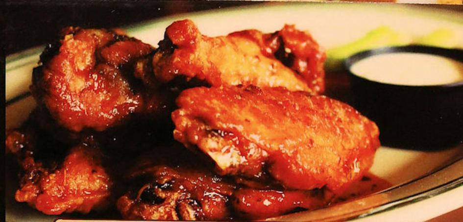 Chicken Wings · 6 wings in your choice of sauce. Extra items for an additional charge.