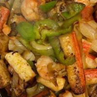Seafood Fajitas · Shrimp, scallops and crab meat.
