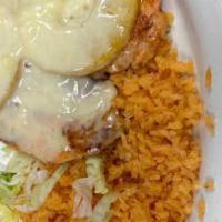 Pineapple Chicken · Grilled chicken breast topped with cheese sauce and sliced pineapple. Served with rice, sala...