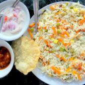 Vegetarian Biryani · Vegetable biryani is a traditional Mughlai main course item loaded with chopped vegetables, ...