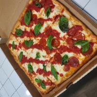 Grandma Pie · Thin Crust Square Pie. Topped with Mozzarella Cheese and Fresh Basil.... Only difference is ...