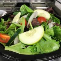 Garden Salad · Mixed greens, tomato, onion, cucumber, and croutons.