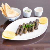 Yabrak Inab · Traditional grape leaves stuffed with rice and ground beef.