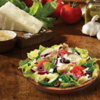 LG Greek Salad · Green leaf, cucumbers, tomato, red onion, black olives, green peppers, artichokes, and feta. 