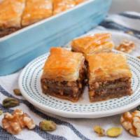 Baklava · 3 pieces. Sweet layered pastry with chopped nuts sweetened with syrup.