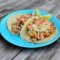 2 Baja Fish Tacos · 2 large tacos with breaded fish and topped with cabbage, pico de gallo and chipotle mayo.