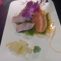 J15. Sashimi Appetizer · Chef choice 7 pieces of sashimi.