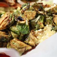 Brussels Sprout · Brussels sprout fried with chunks of bacon, minced garlic, Parmesan and drizzled with balsam...