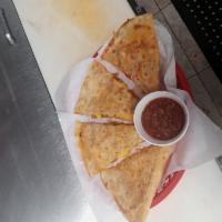 Cheese Quesadilla · Large flour tortilla, Jack and cheddar cheese, onions, green chili, served with a salsa and ...