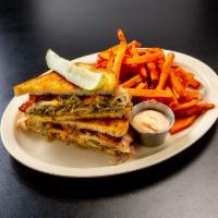 Patty Melt · 1/2 lb. Angus patty served grilled onions and Swiss cheese on rye. Served with a pickle spear.