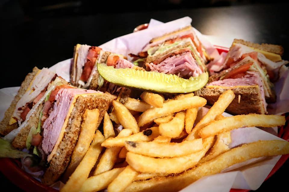 High 5 Club Sandwich · Turkey, bacon, ham, American cheese, lettuce, tomato and mayonnaise served on choice of bread.