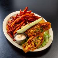 Buffalo Chicken Wrap · Breaded chicken tenders dipped in Buffalo sauce (hot, medium or mild) lettuce, tomato and on...