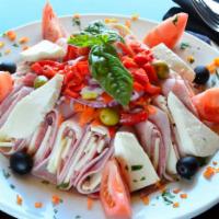 Antipasto Salad · Iceberg, romaine, ham, salami, provolone, fresh mozzarella, tomatoes, red onions, olives, ro...