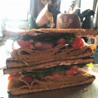 Praise Seitan Sandwich · Vegan. Be-hive seitan, red onions, tomatoes, mixed greens with vegenaise and creole mustard ...