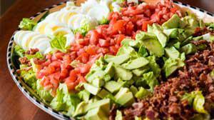 BT Cobb Salad · Grilled chicken, bacon, tomato, cucumber, red onion-chopped egg and crumbled bleu cheese.